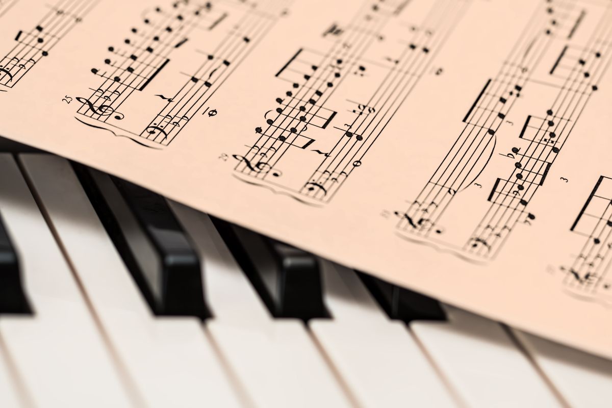 Sheet music resting on piano keys, gifts for children who love music