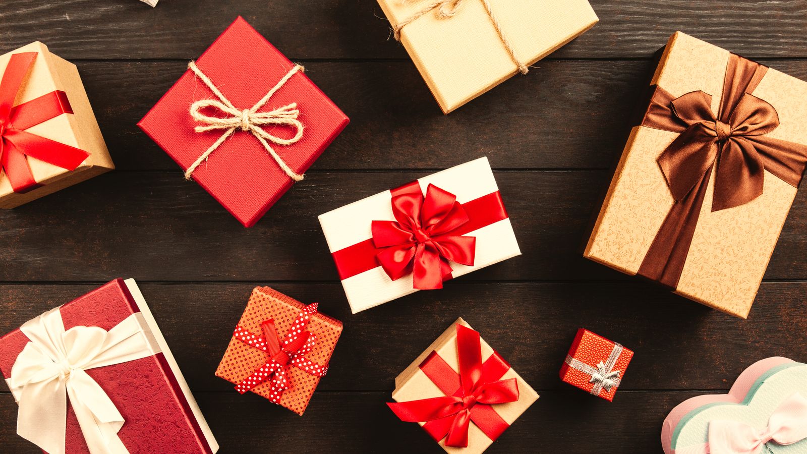 Colourful wrapped gift boxes with ribbons on a table — personalised birthday gifts for children UK