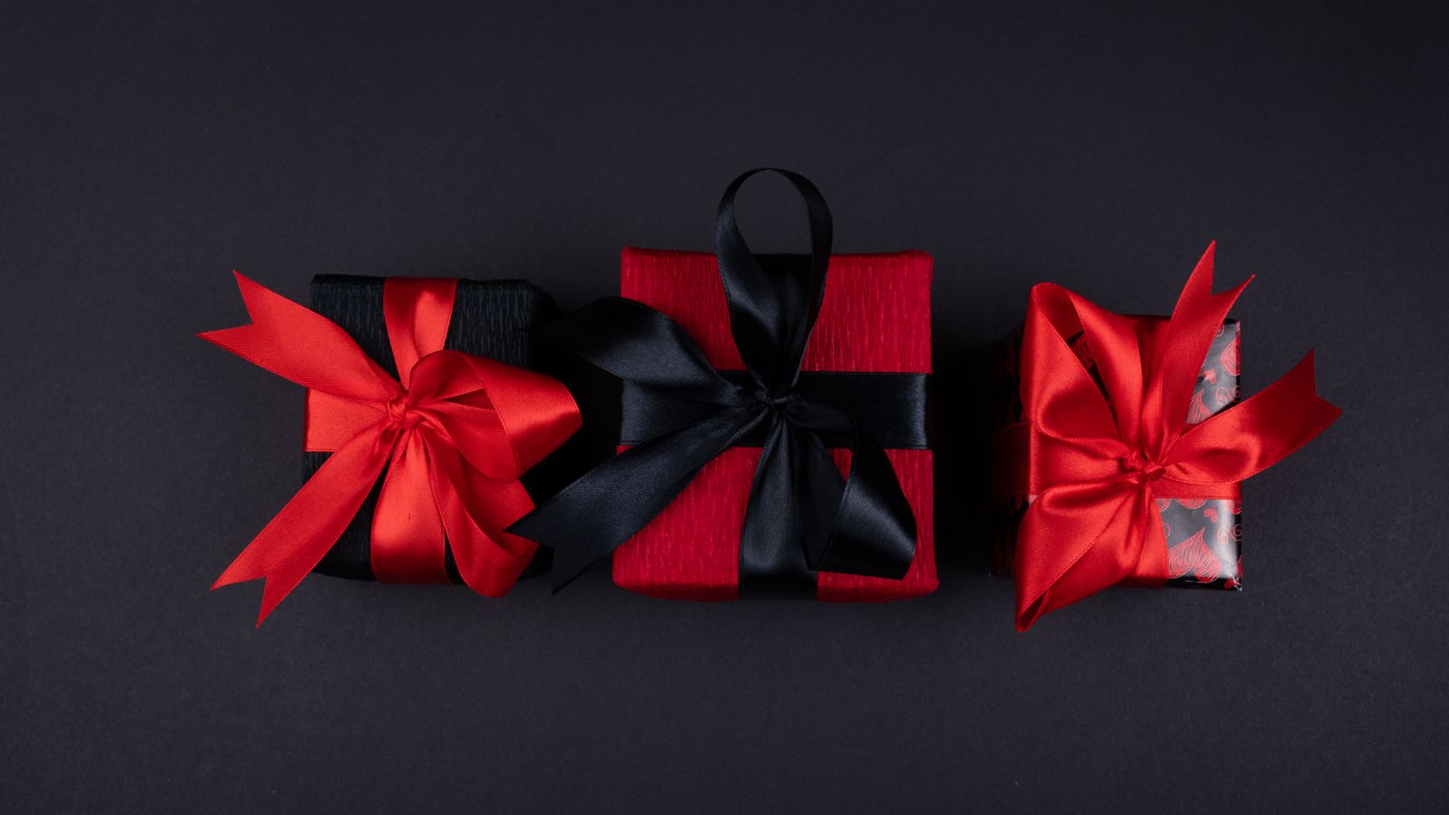 Elegantly wrapped gift boxes with satin ribbons — personalised gifts for grandchildren UK